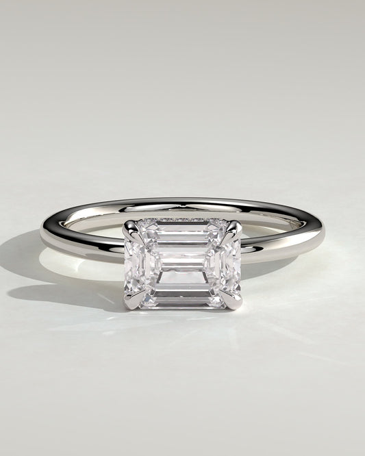 Zayla - Emerald East West Claw Solitaire with Hidden Halo Engagement Ring - White Gold