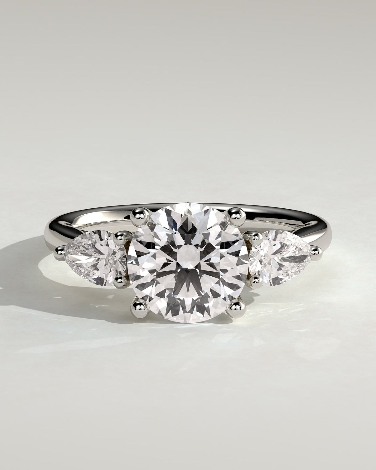 Adelyn - Round Claw Trilogy with Pear Side Stones and Open Trellis Gallery Engagement Ring - White Gold - white gold - Lara Jewels