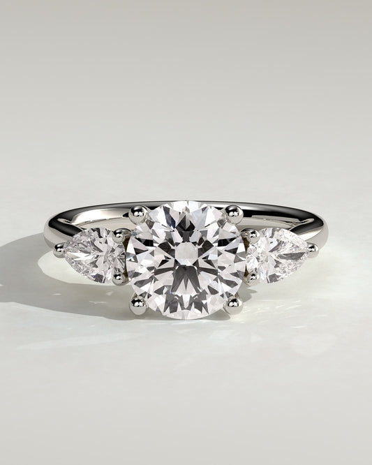Adelyn - Round Claw Trilogy with Pear Side Stones and Open Trellis Gallery Engagement Ring - White Gold - white gold - Lara Jewels