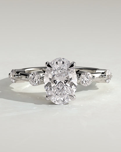 Arwen - Oval Claw Solitaire with 4 Spaced Round Accent Stones and Hidden Halo Engagement Ring - Platinum