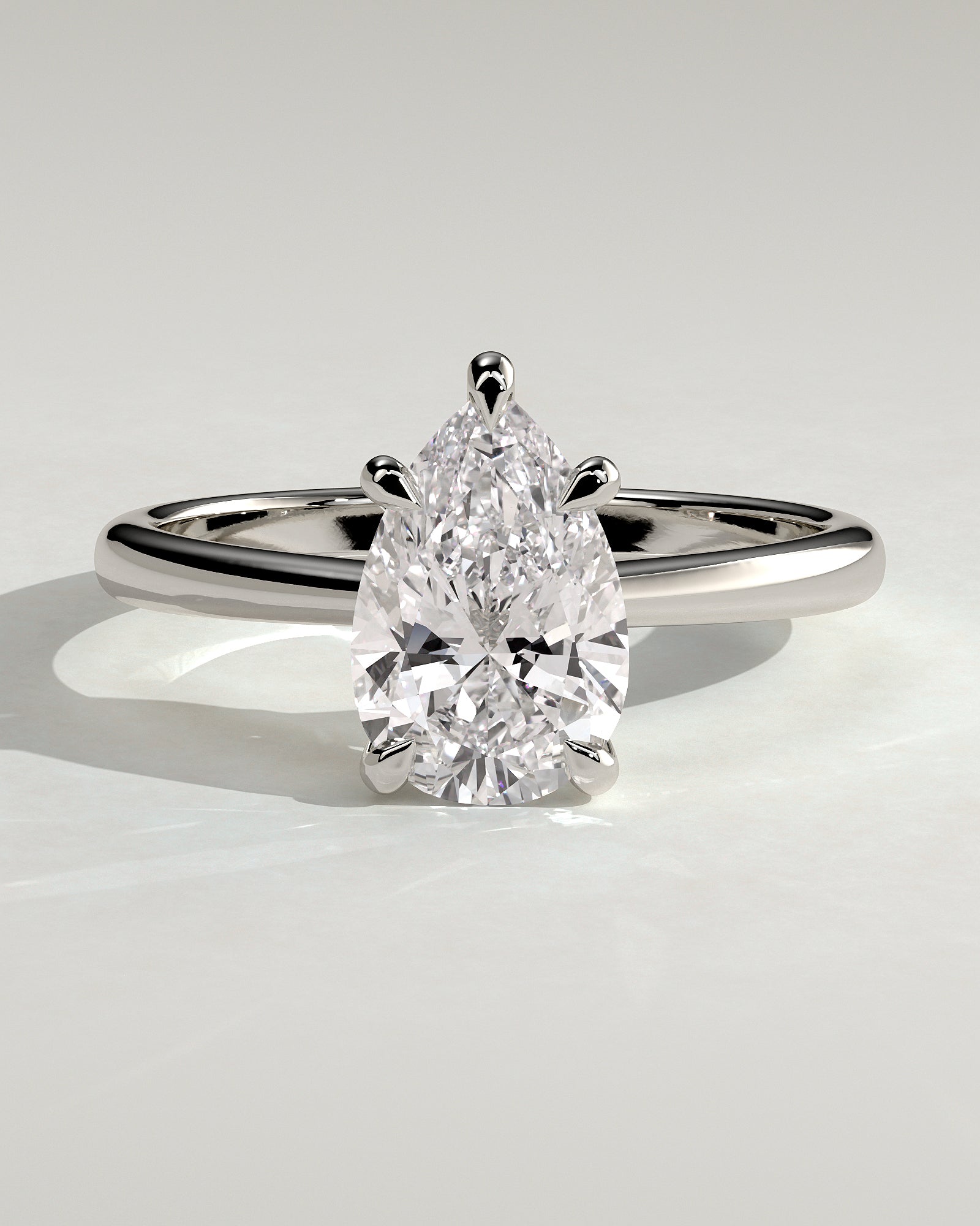Aspen - Pear Claw Solitaire with Pinched Tapered Band and Cathedral Low Setting Engagement Ring - Platinum - White Gold / Platinum 2ct