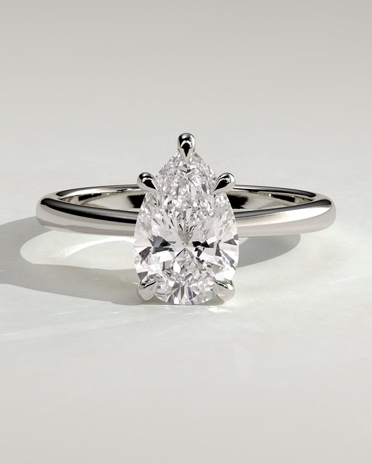 Aspen - Pear Claw Solitaire with Pinched Tapered Band and Cathedral Low Setting Engagement Ring - Platinum