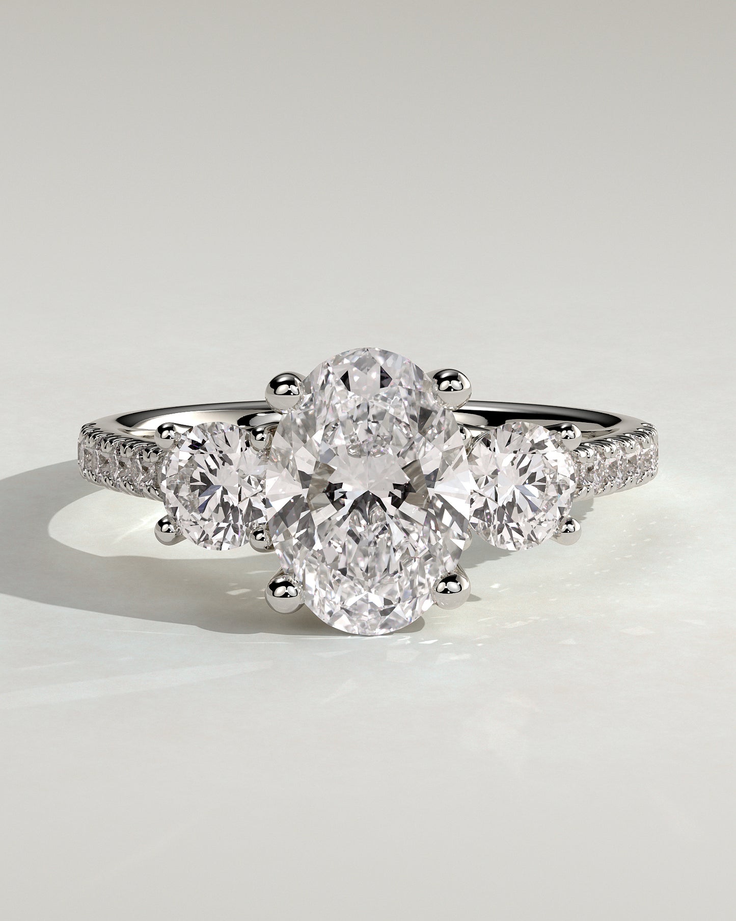 Aviana - Oval Claw Trilogy with Round Side Stones, Pave Band and Trellis Gallery  Engagement Ring - Platinum - White Gold / Platinum 2ct