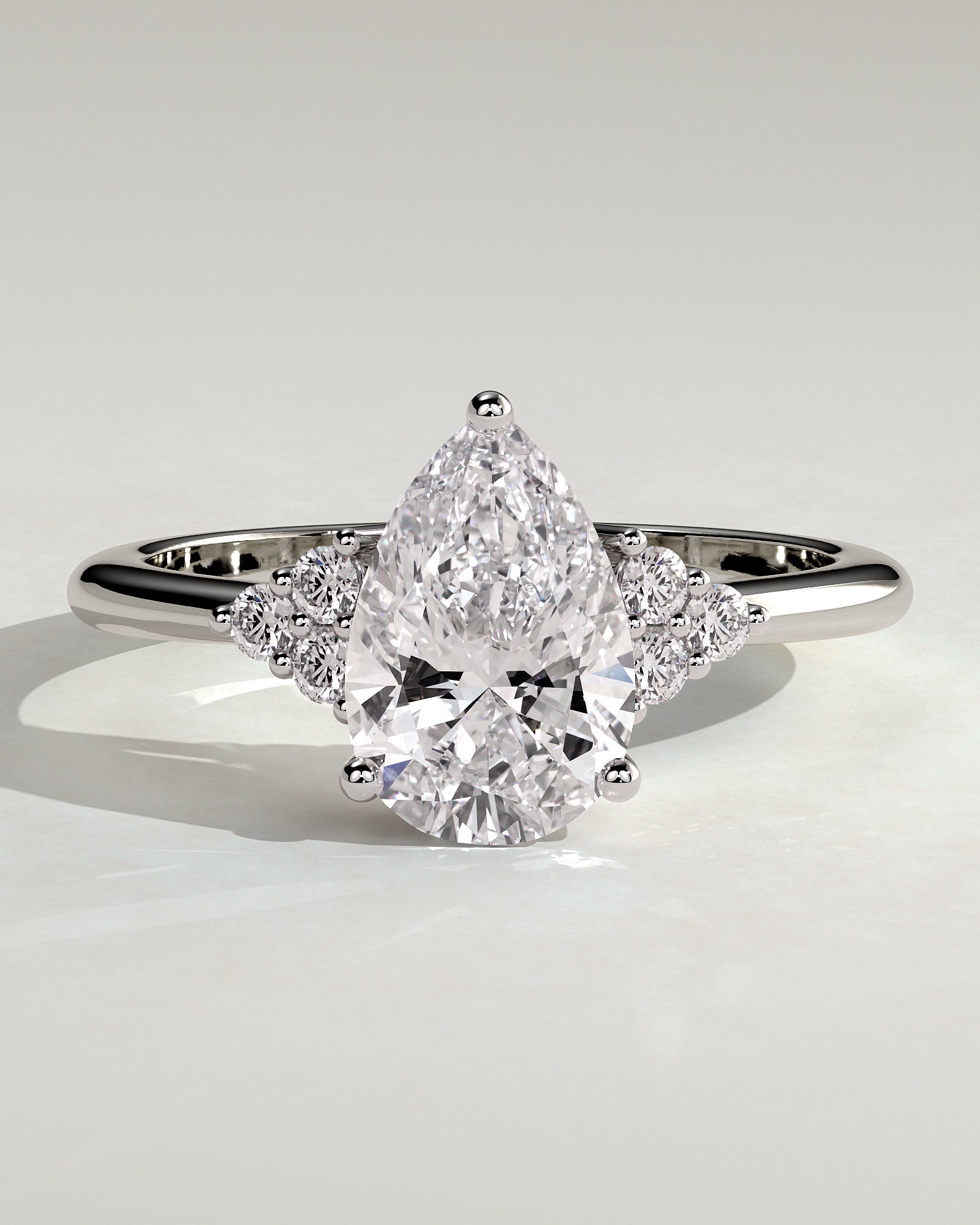 Brooke - Pear Claw Solitaire with Round Shoulder Stones Engagement Ring - Platinum - White Gold / Platinum 2ct