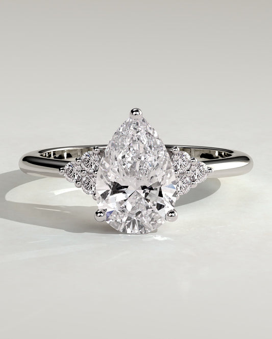 Brooke - Pear Claw Solitaire with Round Shoulder Stones Engagement Ring - Platinum