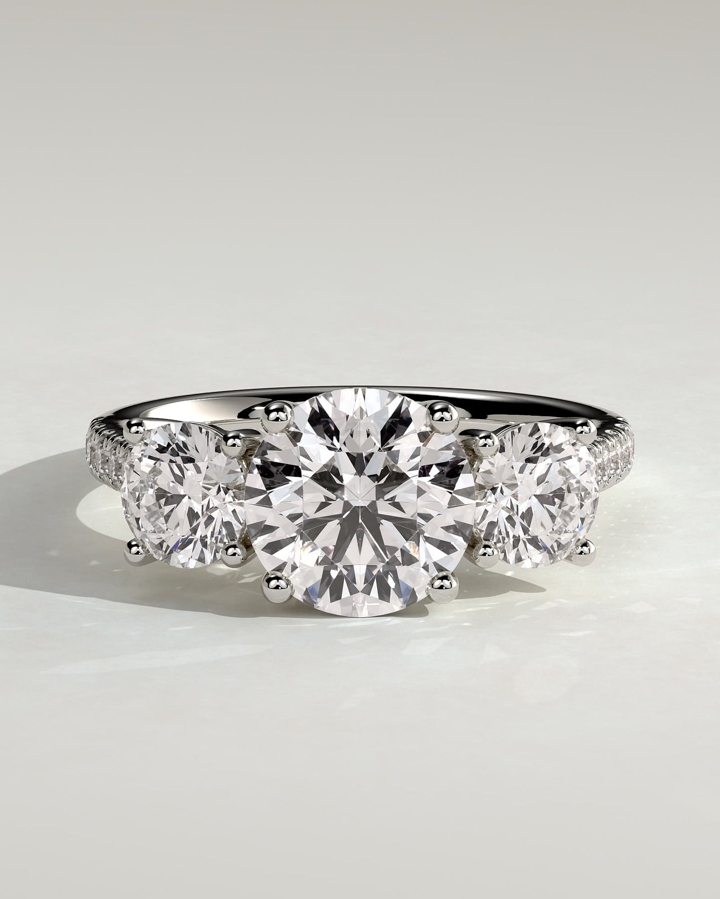 Ella - Round Claw Trilogy with Round Side Stones, Pave Band and Trellis Gallery  Engagement Ring - White Gold