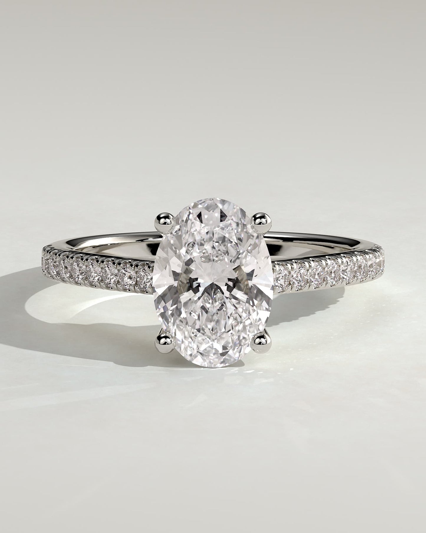 Eloise - Oval Claw Solitaire with Pave Band and Solid Cathedral Low Setting Engagement Ring - White Gold