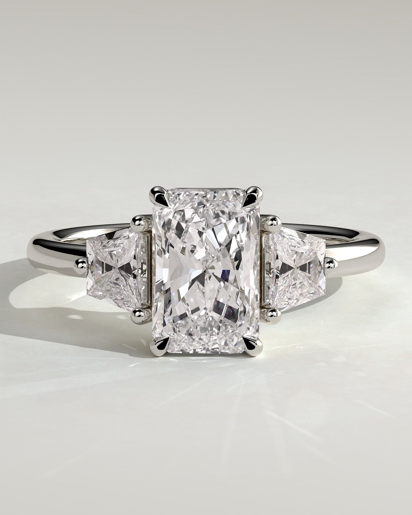 Juliette - Radiant Claw Trilogy with Trapezoid Side Stones and Low Setting Engagement Ring - White Gold