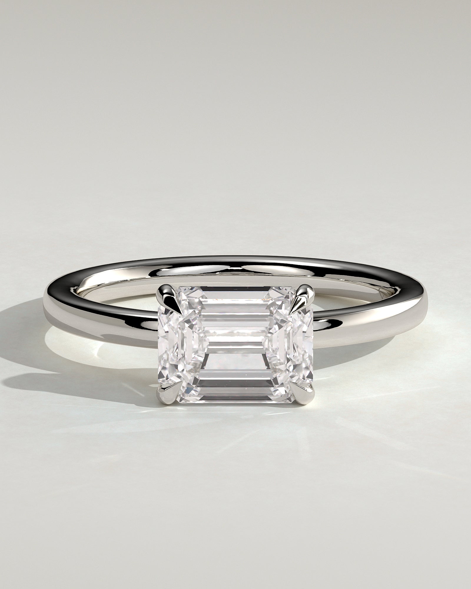 Evelyn - Emerald East West Claw Solitaire with Raised Basket Gallery Engagement Ring - Platinum - White Gold / Platinum 2ct