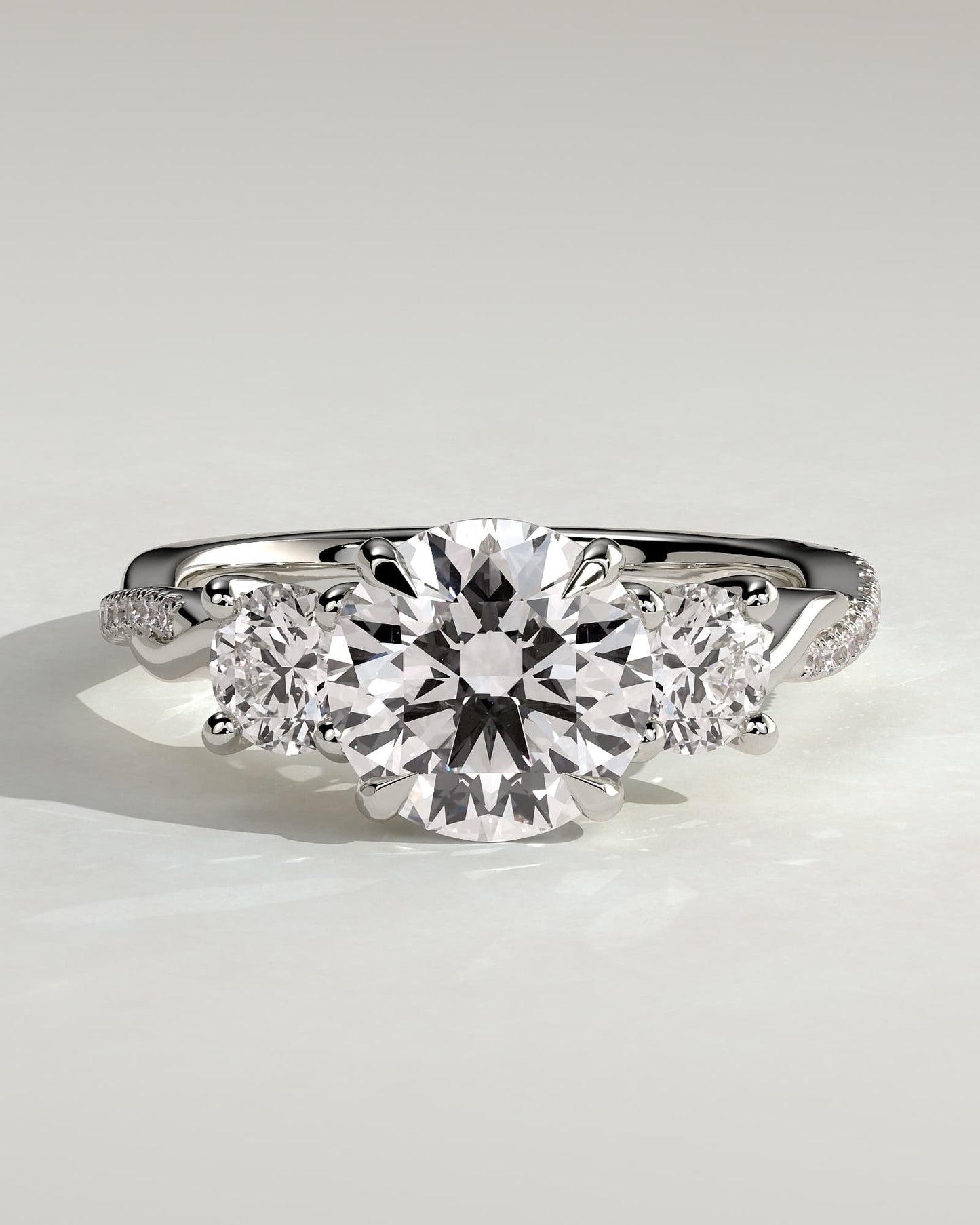 Jaylene - Round Claw Trilogy with Round Side Stones, Twisted Pave Band and Trellis Gallery Engagement Ring - White Gold