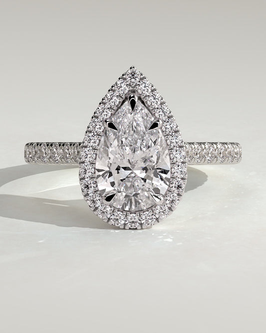 Madeline - Pear Claw Solitaire with Halo and Pave Band and Cathedral High Setting Engagement Ring - White Gold