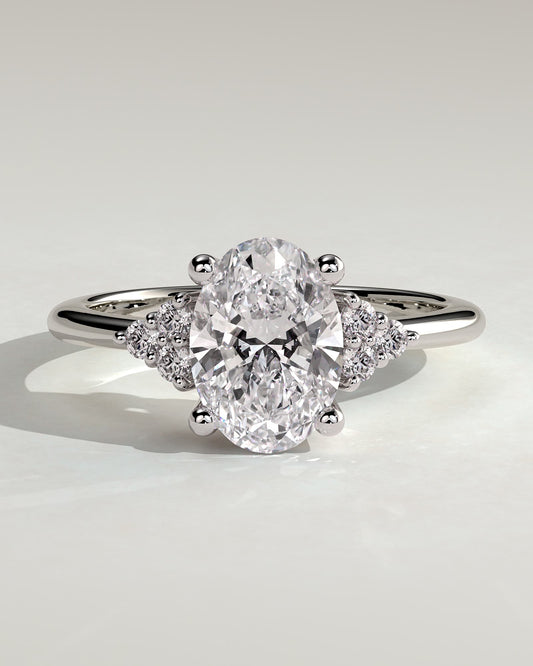 Sharon - Oval Claw Solitaire with Round Shoulder Stones Engagement Ring - Platinum