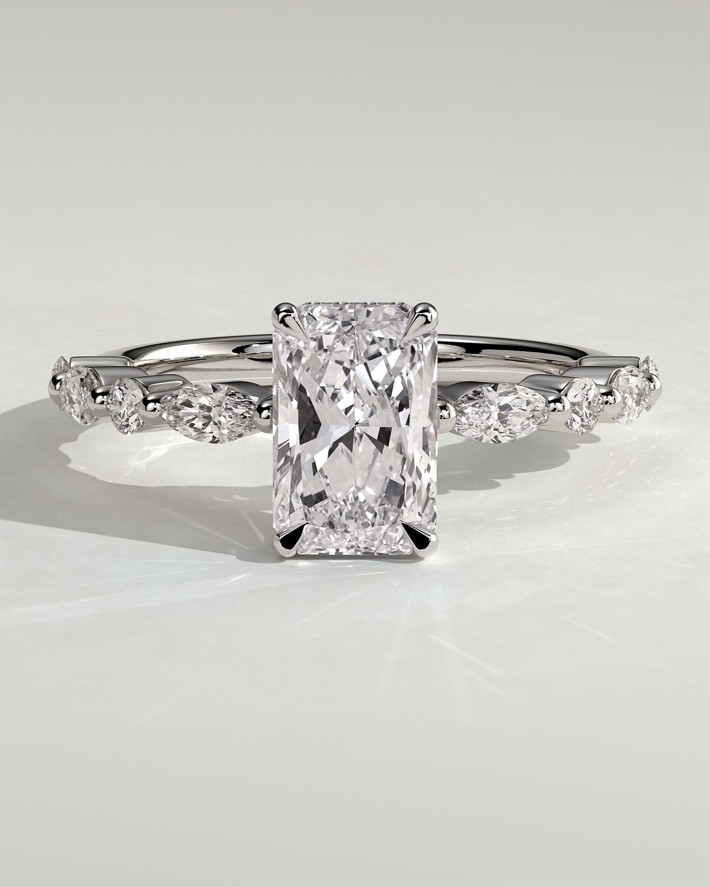 Kyla - Radiant Claw Solitaire with Marquise-Round Accent Stones and Wrap Around Hidden Halo Engagement Ring - White Gold