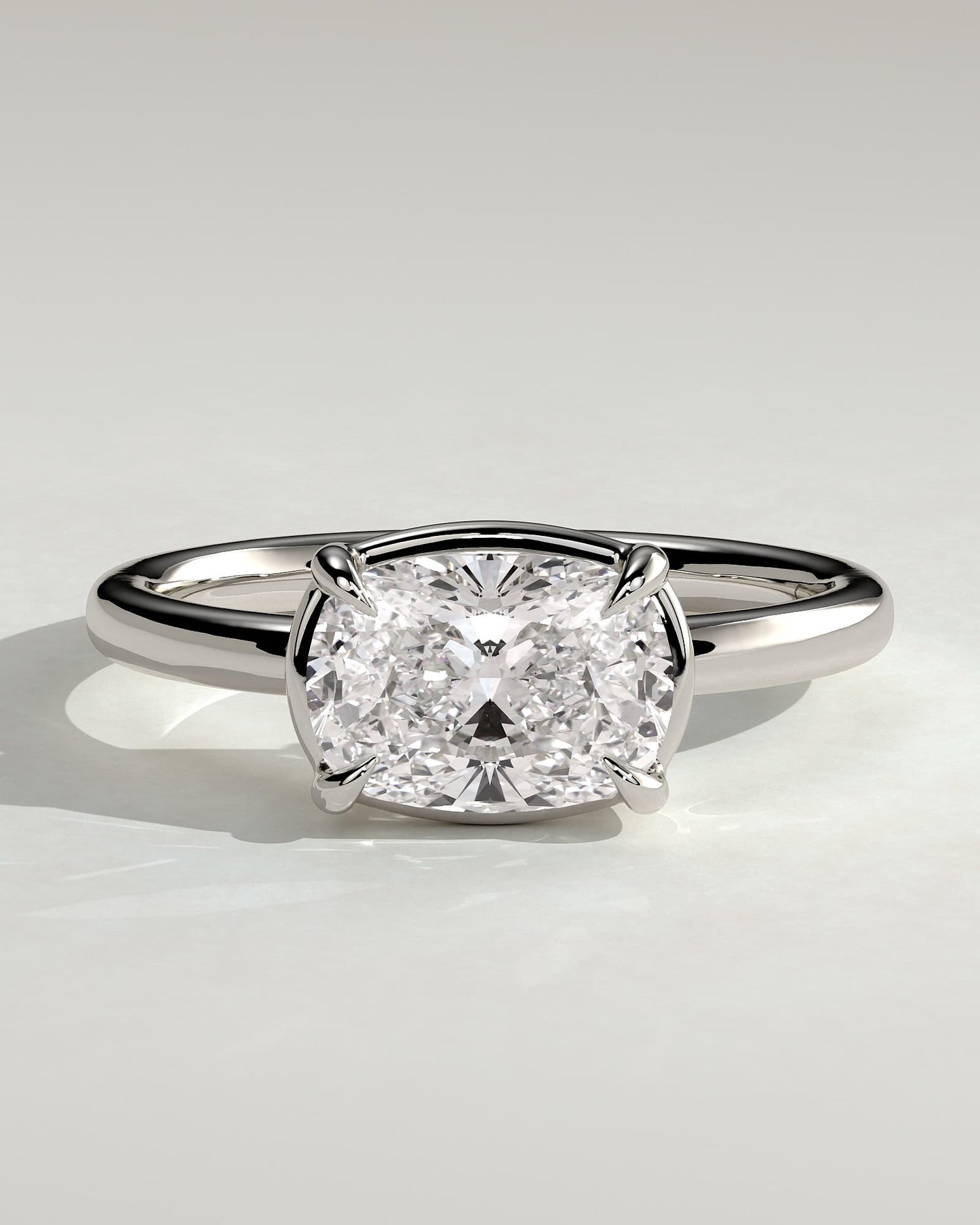Daya - Elongated Cushion East West Claw Solitaire with Bezel Frame Engagement Ring - White Gold