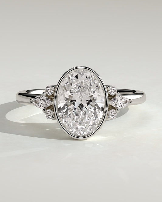 Meesha - Oval Bezel Solitaire with Marquise-Round Shoulder Stones and Cathedral High Setting Engagement Ring - White Gold