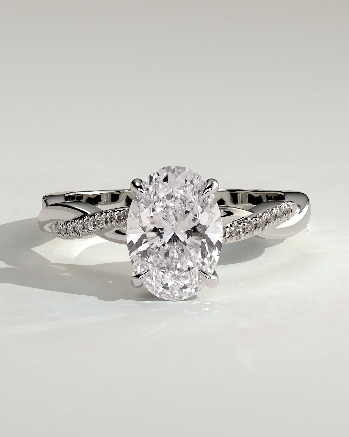 Lara - Oval Claw Solitaire with Hidden Halo and Twisted Alternating Pave Band Engagement Ring - Platinum