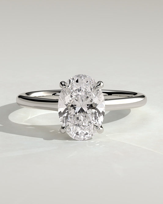 Olivia - Oval Claw Solitaire with Cathedral Low Setting and Open Trellis Gallery Engagement Ring - Platinum