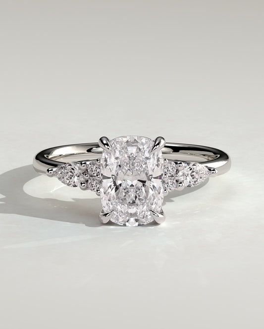 Sadie - Elongated Cushion Claw Solitaire with Pear Accents and Round Shoulder Stones Engagement Ring - Platinum