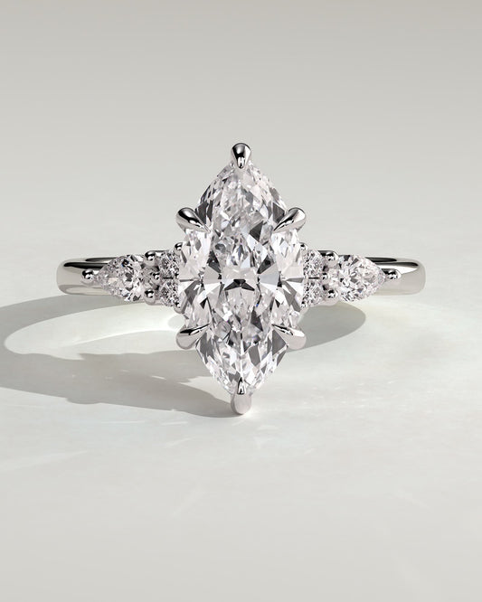 Loretta - Marquise Claw Solitaire with Pear Accents and Round Shoulder Stones Engagement Ring - Platinum