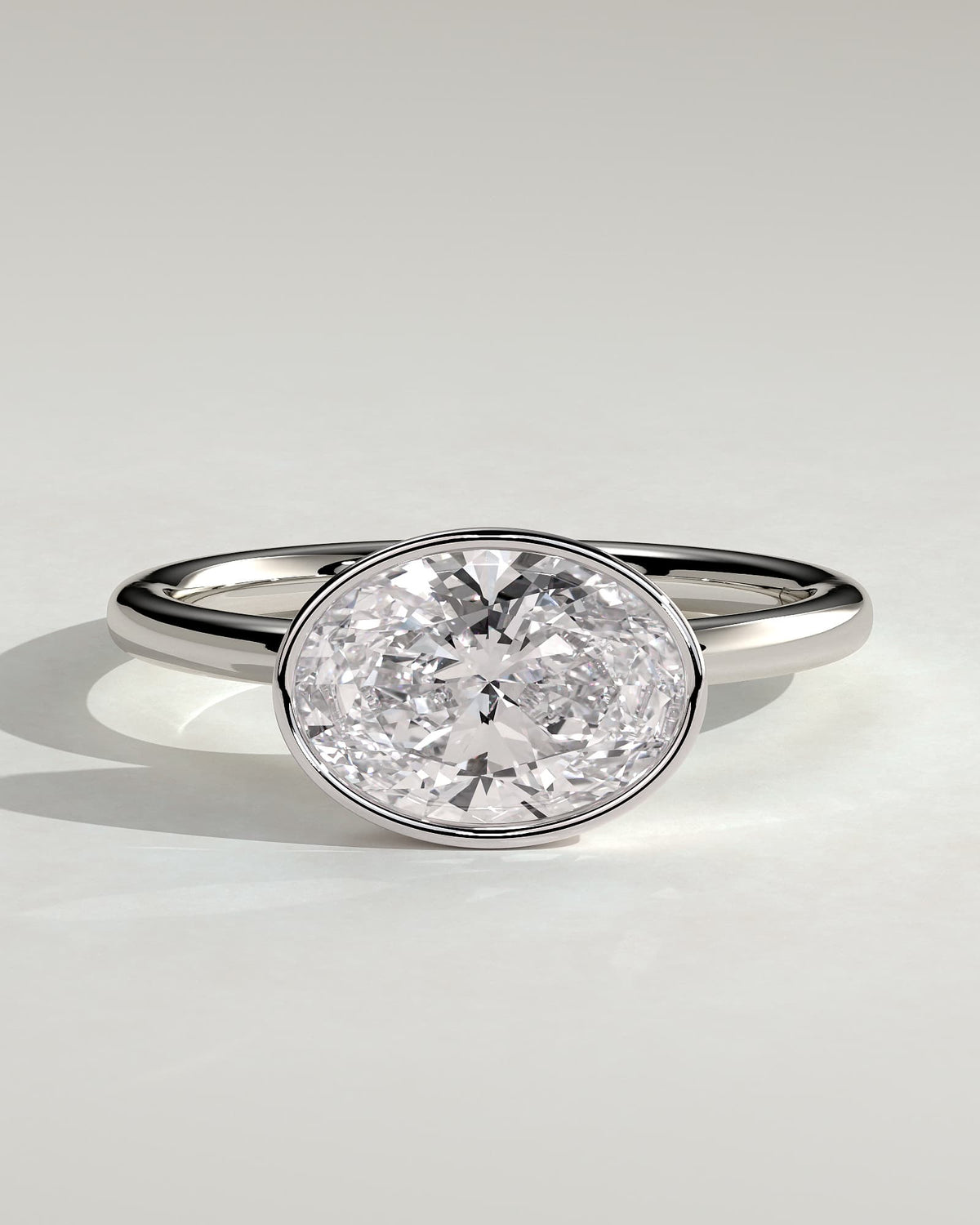 Erin - Oval East West Bezel Solitaire  Engagement Ring - White Gold