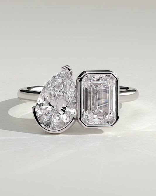 Margot - Pear and Emerald Bezel-and-Half-Bezel Toi et Moi Engagement Ring - White Gold
