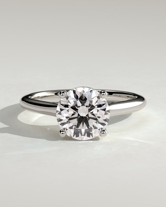 Noelle - Round Claw Solitaire with Trellis Gallery and Cathedral Low Setting Engagement Ring - Platinum