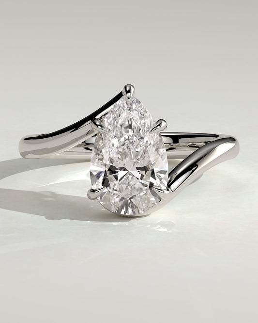 Jennifer - Pear Claw Solitaire with Bypass Band Engagement Ring - White Gold