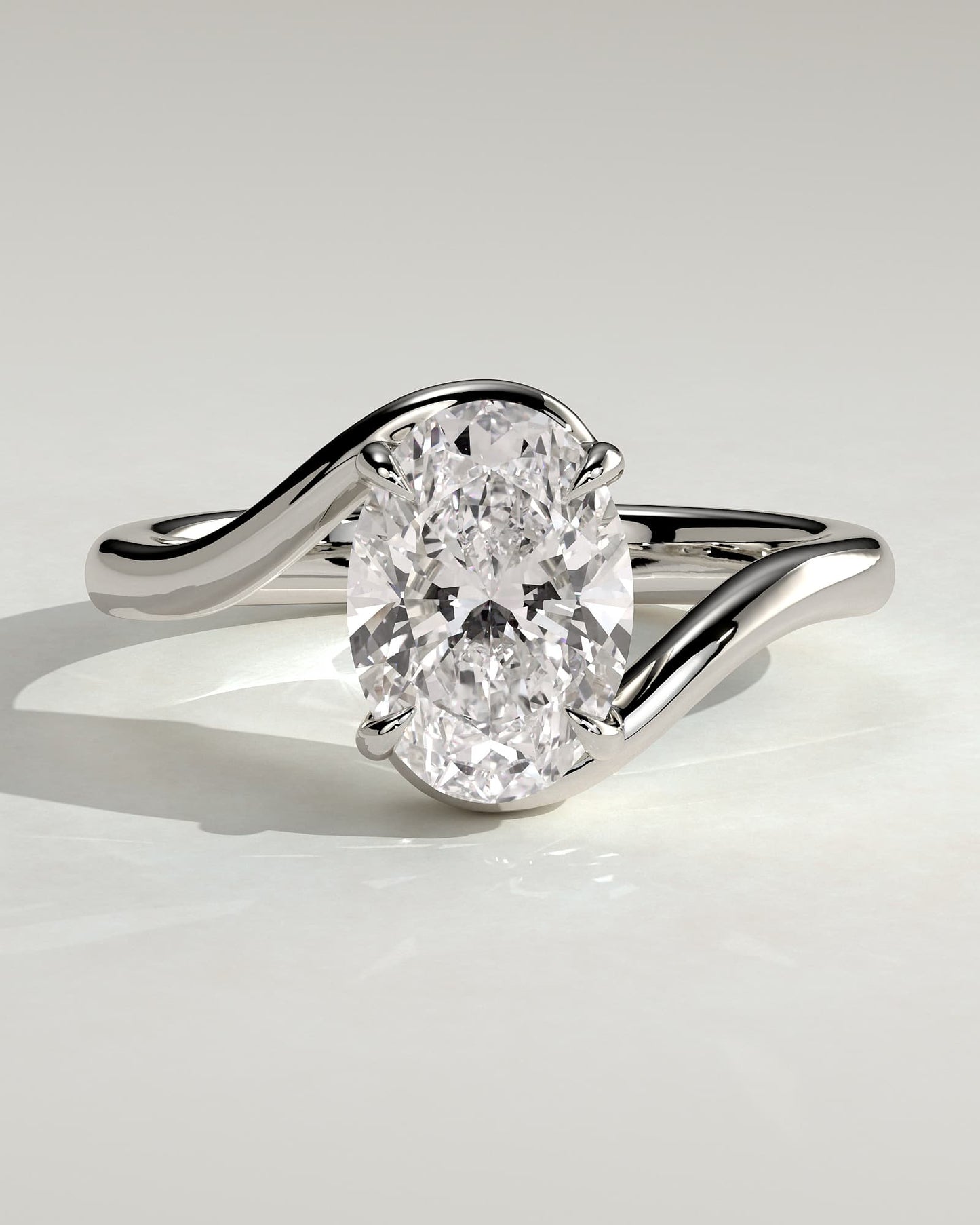 Kala - Oval Claw Solitaire with Bypass Band Engagement Ring - White Gold