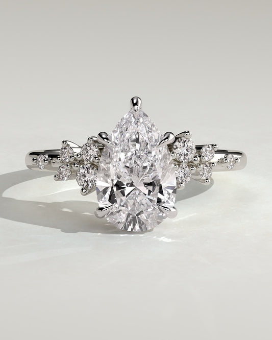 Polly - Pear Claw Solitaire with Clustered Round Shoulder Stones Engagement Ring - Platinum