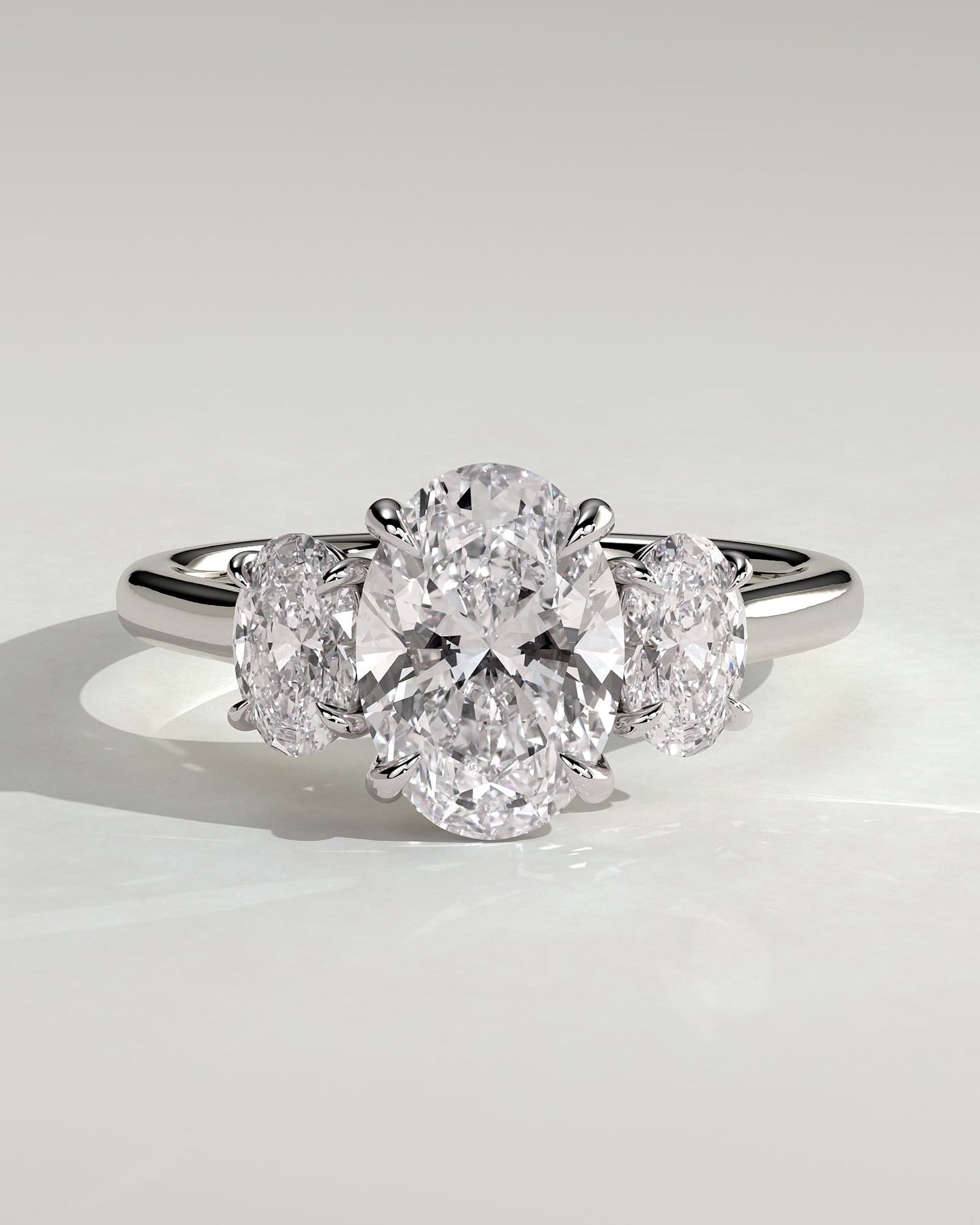 Isla - Oval Claw Trilogy with Oval Side Stones Engagement Ring - White Gold