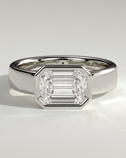 Adrian - Statement Emerald East West Bezel Solitaire with Flat Cigar Band Engagement Ring - Platinum - platinum - Lara Jewels