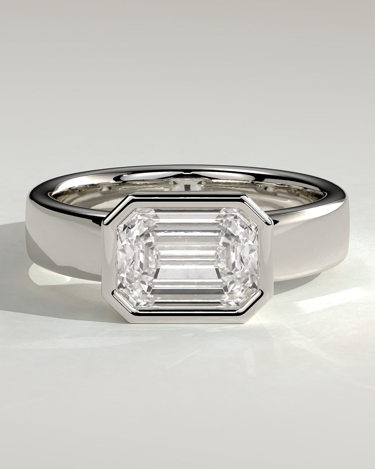 Adrian - Statement Emerald East West Bezel Solitaire with Flat Cigar Band Engagement Ring - White Gold - white gold - Lara Jewels