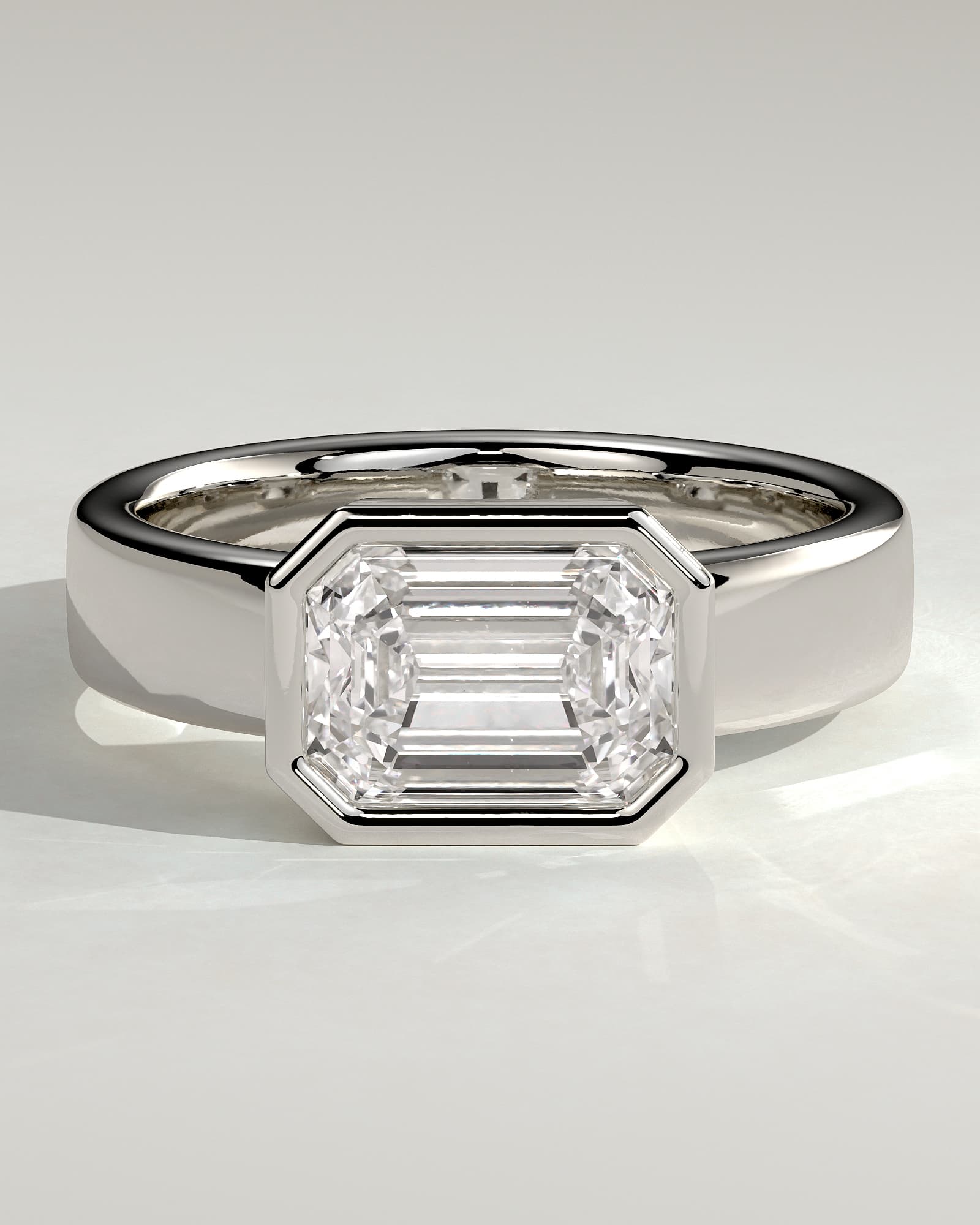 Adrian - Statement Emerald East West Bezel Solitaire with Flat Cigar Band Engagement Ring - White Gold - white gold - Lara Jewels