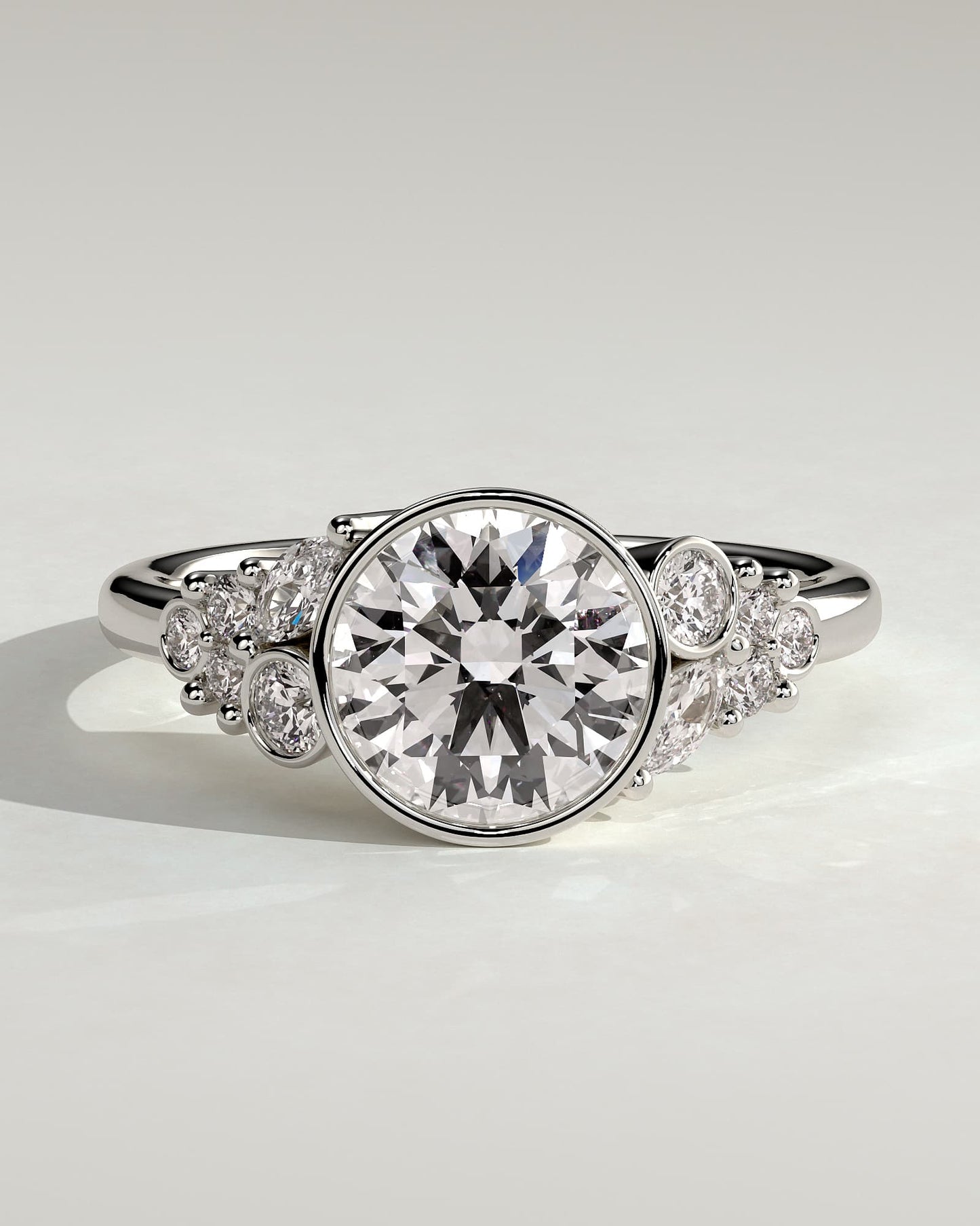 Alessia - Round Bezel Solitaire with Clustered Round-Marquise Mixed Set Shoulder Stones Engagement Ring - White Gold - white gold - Lara Jewels