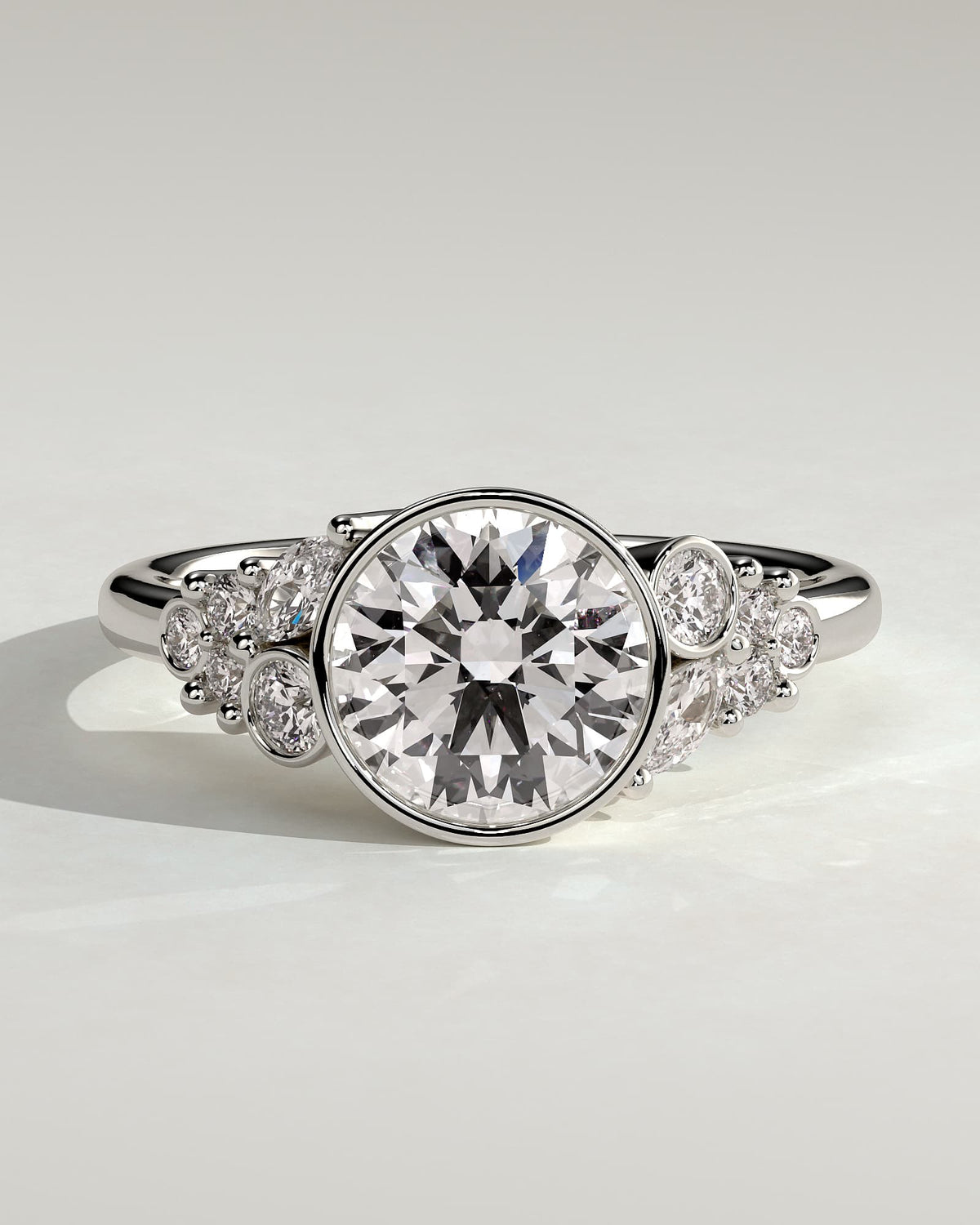 Alessia - Round Bezel Solitaire with Clustered Round-Marquise Mixed Set Shoulder Stones Engagement Ring - White Gold - white gold - Lara Jewels