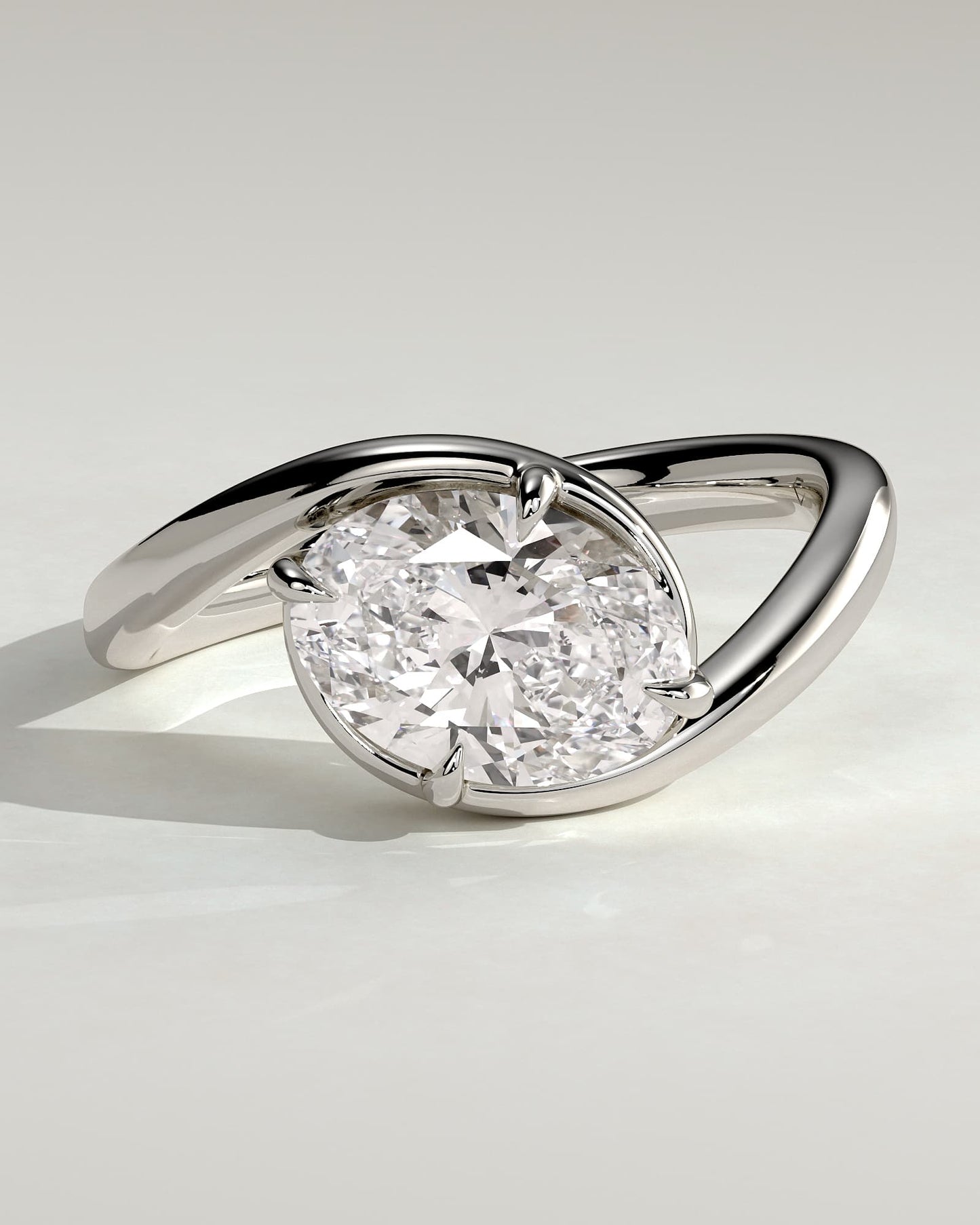 Casey - Oval East West Claw Solitaire with Bypass Band  Engagement Ring - White Gold
