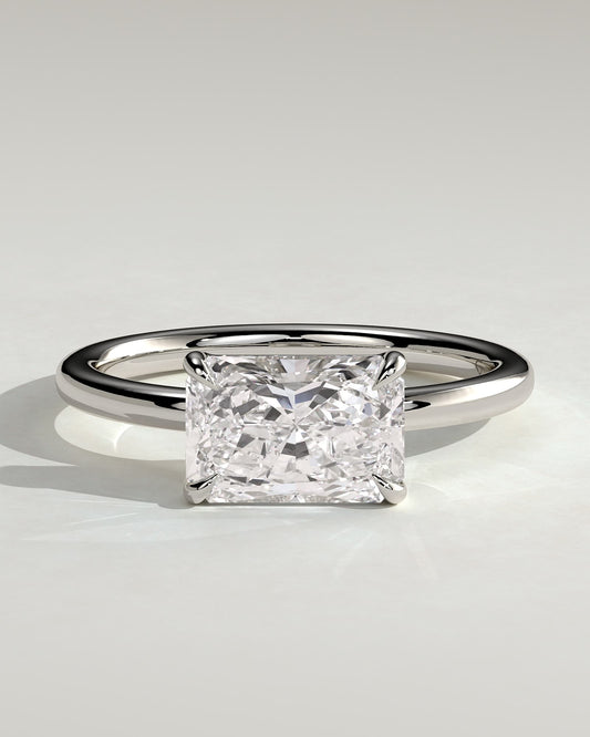 Zara - Radiant East West Claw Solitaire with Raised Basket Gallery Engagement Ring - White Gold