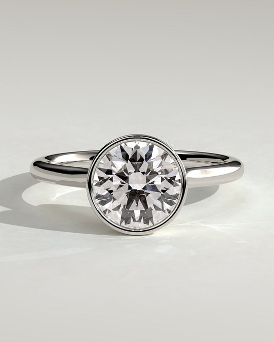 Maeve - Round Bezel Solitaire with Twisted Gallery Engagement Ring - Platinum