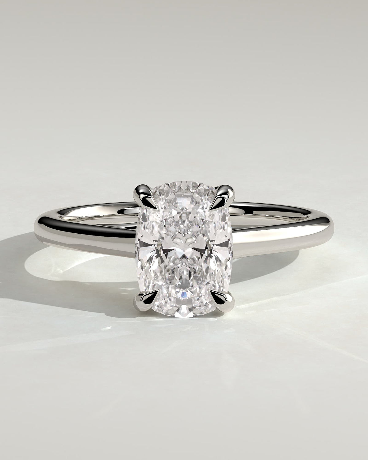 Kelsey - Elongated Cushion Claw Solitaire with Cathedral Low Setting and Open Trellis Gallery Engagement Ring - White Gold