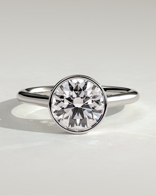 Kaylah - Statement Round Bezel Solitaire with Open Cathedral High Setting Engagement Ring - Platinum