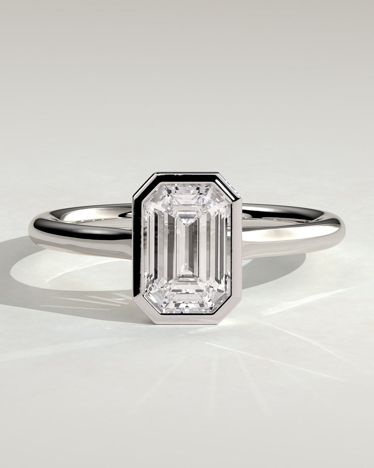 Journee - Statement Emerald Bezel Solitaire with Open Cathedral High Setting Engagement Ring - White Gold