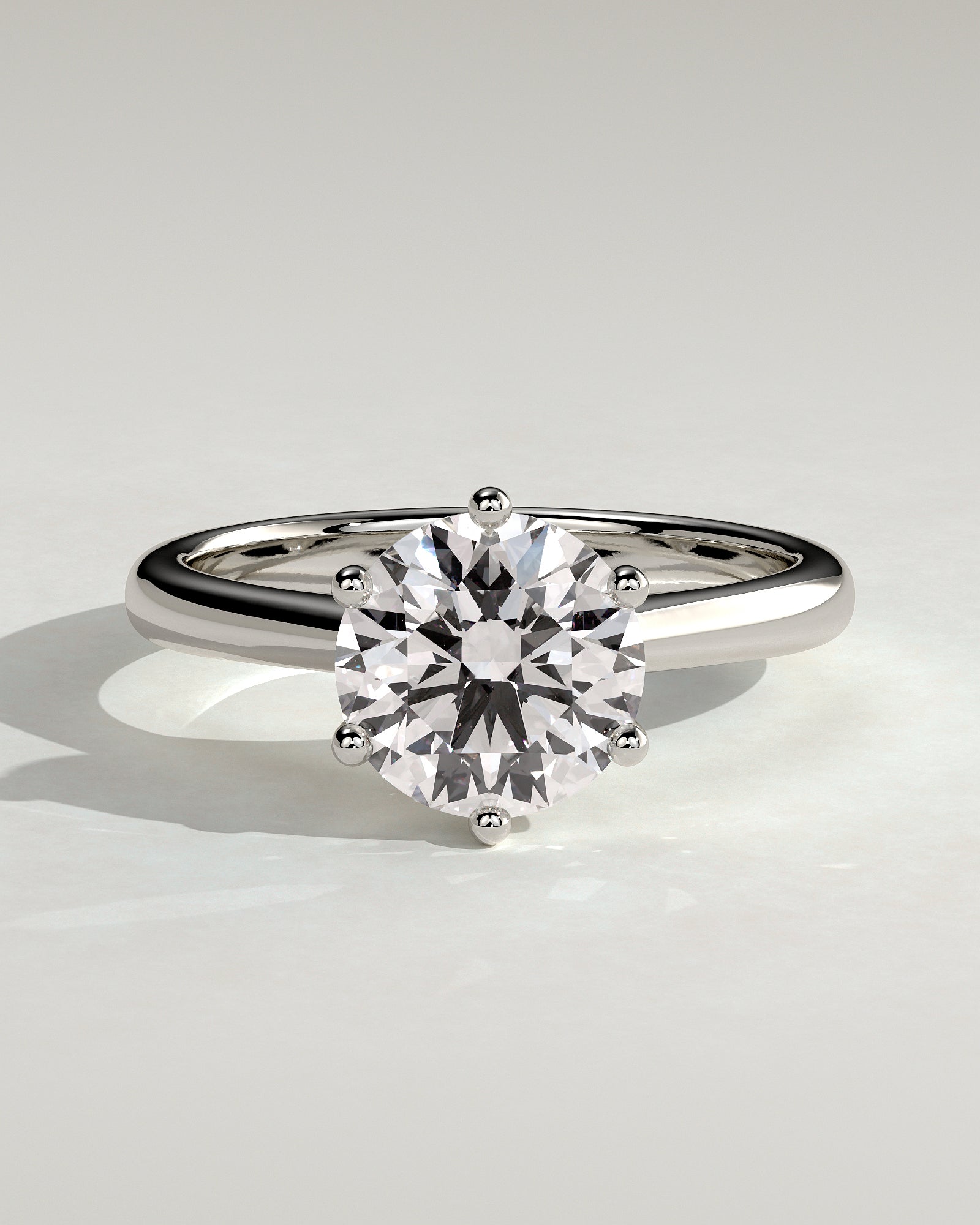 Jacqueline - Round Claw Solitaire with Solid Cathedral Low Setting Engagement Ring - Platinum - White Gold / Platinum 2ct
