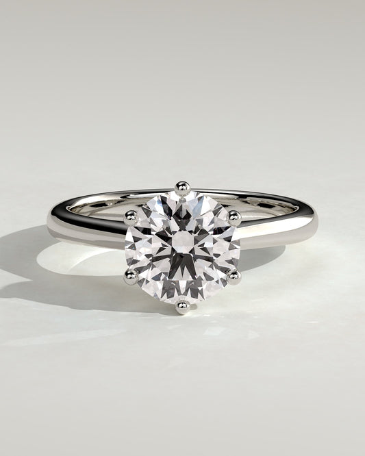 Jacqueline - Round Claw Solitaire with Solid Cathedral Low Setting Engagement Ring - Platinum