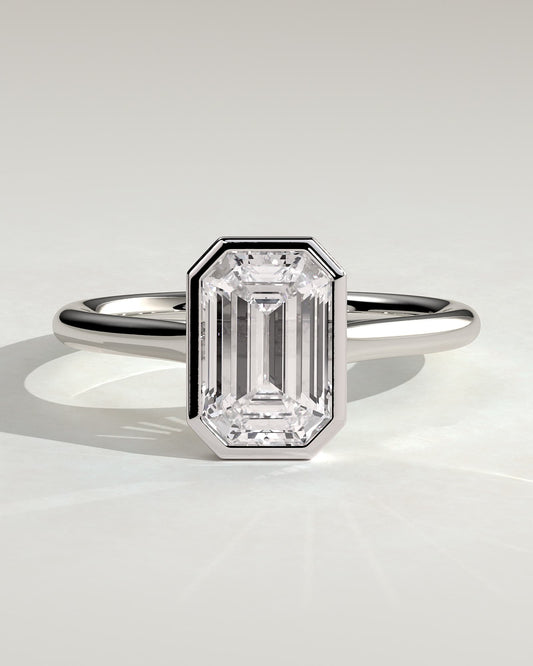 Imani - Emerald Bezel Solitaire with Cathedral High Setting Engagement Ring - White Gold