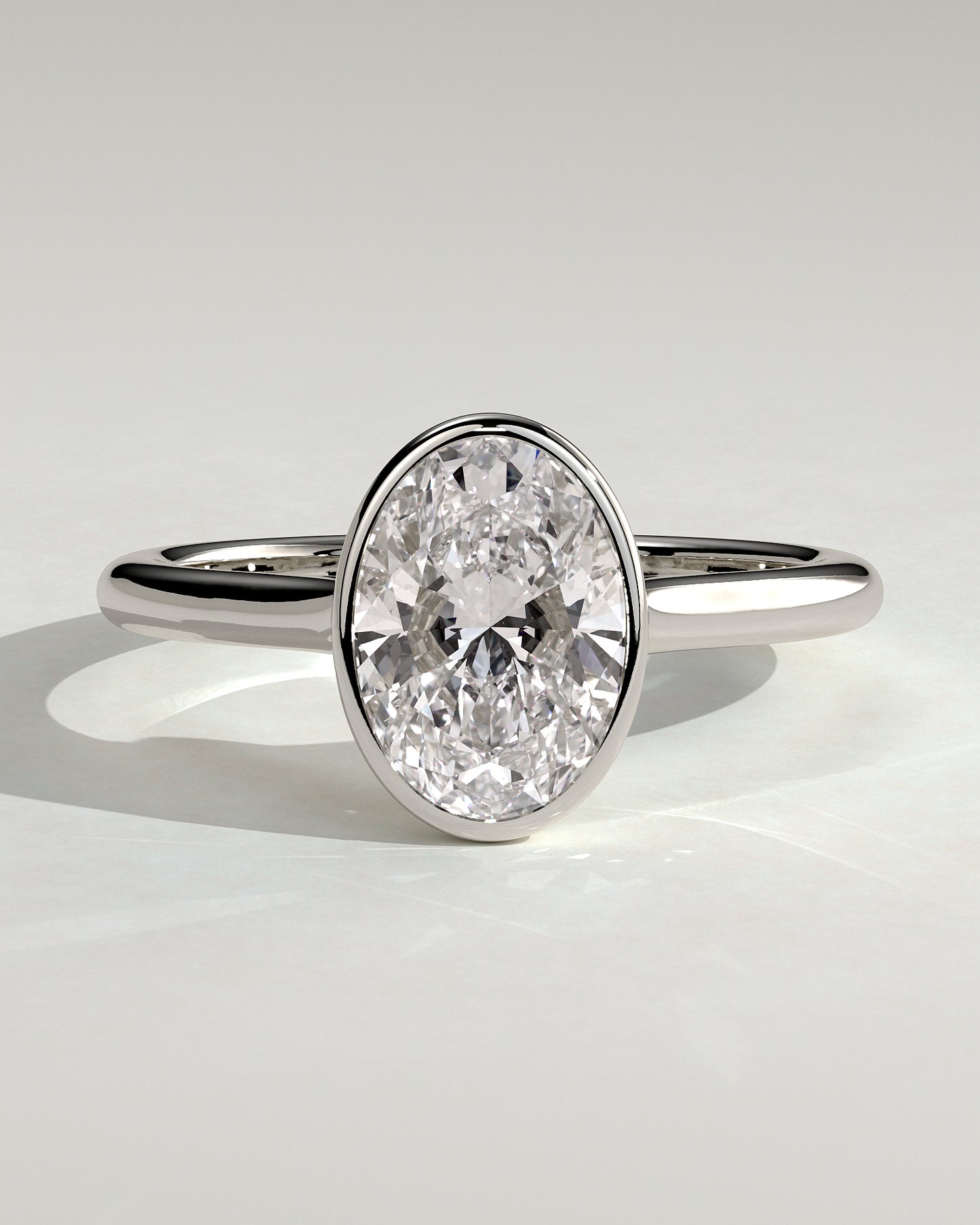 Gemma - Oval Bezel Solitaire with Twisted Gallery Engagement Ring - Platinum - White Gold / Platinum 2ct