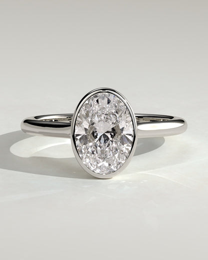 Gemma - Oval Bezel Solitaire with Twisted Gallery Engagement Ring - White Gold