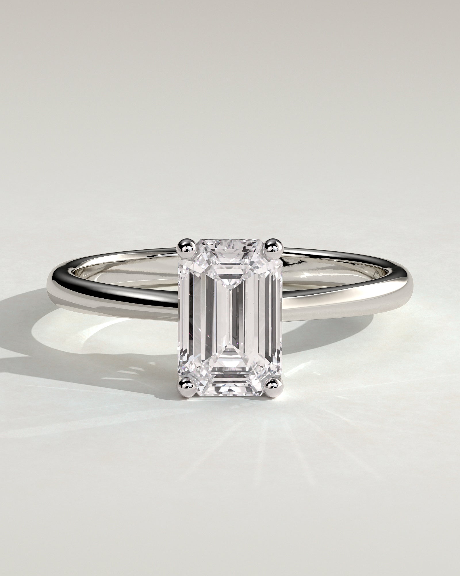 Freya - Emerald Claw Solitaire with Tapered Band and Cathedral Low Setting Engagement Ring - Platinum - White Gold / Platinum 2ct