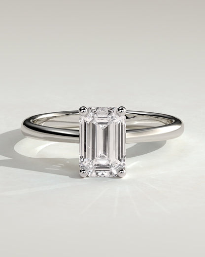 Freya - Emerald Claw Solitaire with Tapered Band and Cathedral Low Setting Engagement Ring - Platinum