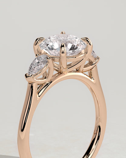 Arya - Round Claw Trilogy with Pear Side Stones and Cathedral Setting Engagement Ring - Rose Gold