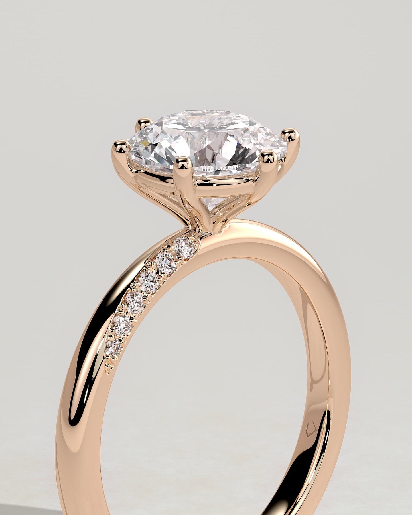Mahlia - Round Claw Solitaire with Sweeping Micropav?Band Engagement Ring - Rose Gold